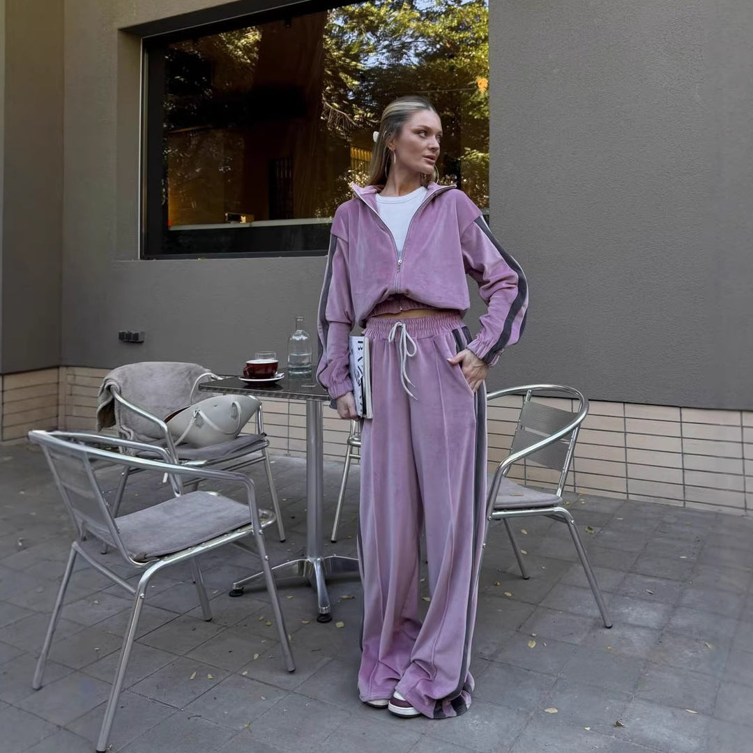 Kvinnors sportiga velour träningsdräkt med kontrasterande färgstripes Mirla-Eva Jonsson