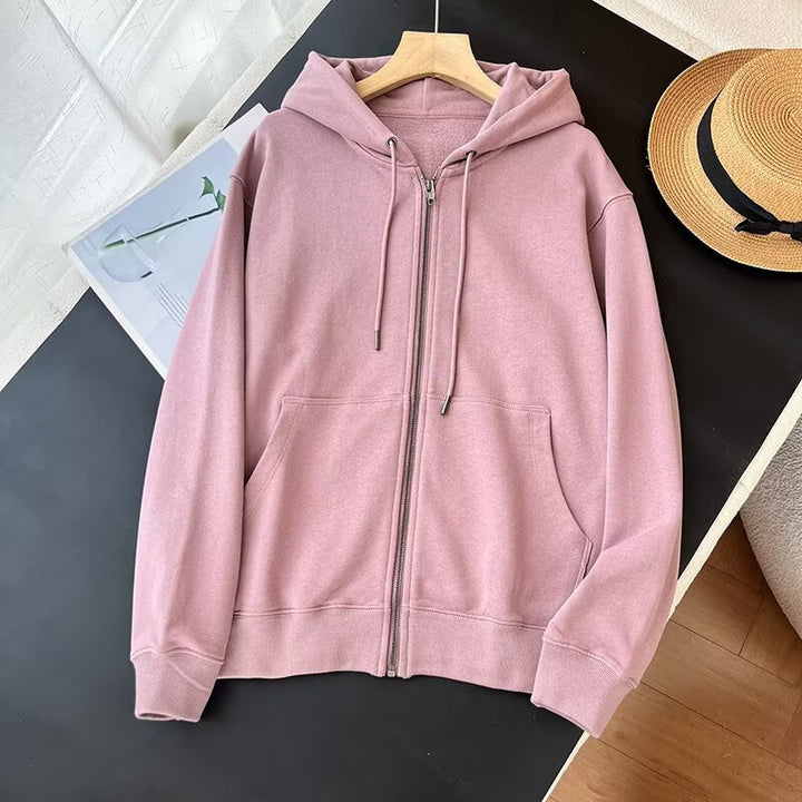 Kvinnors sportiga zip hoodie med praktiska kängurufickor Mirla-Eva Jonsson