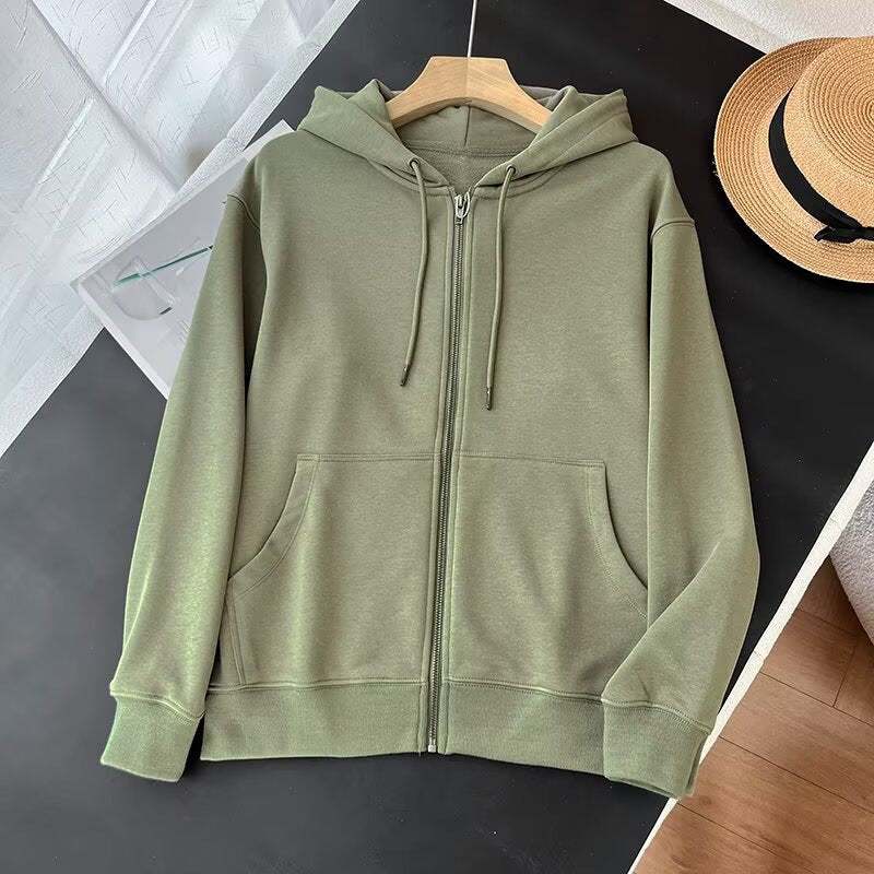 Kvinnors sportiga zip hoodie med praktiska kängurufickor Mirla-Eva Jonsson