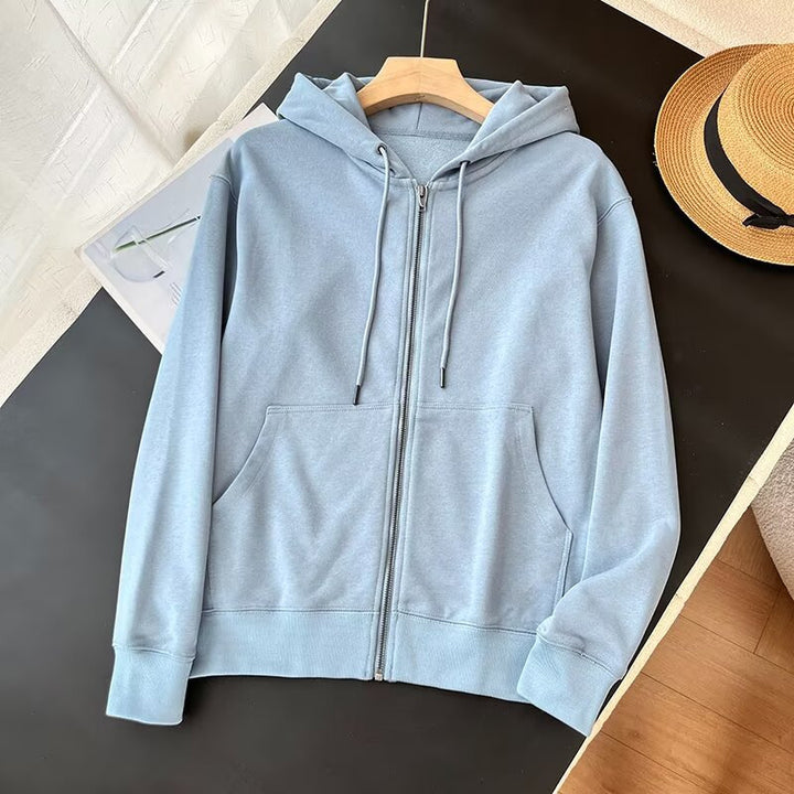 Kvinnors sportiga zip hoodie med praktiska kängurufickor Mirla-Eva Jonsson