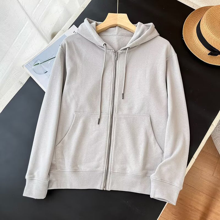 Kvinnors sportiga zip hoodie med praktiska kängurufickor Mirla-Eva Jonsson