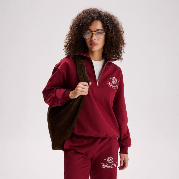 Kvinnors sportiga zip-tröja med en avslappnad passform och elegant broderi Mirla-Eva Jonsson