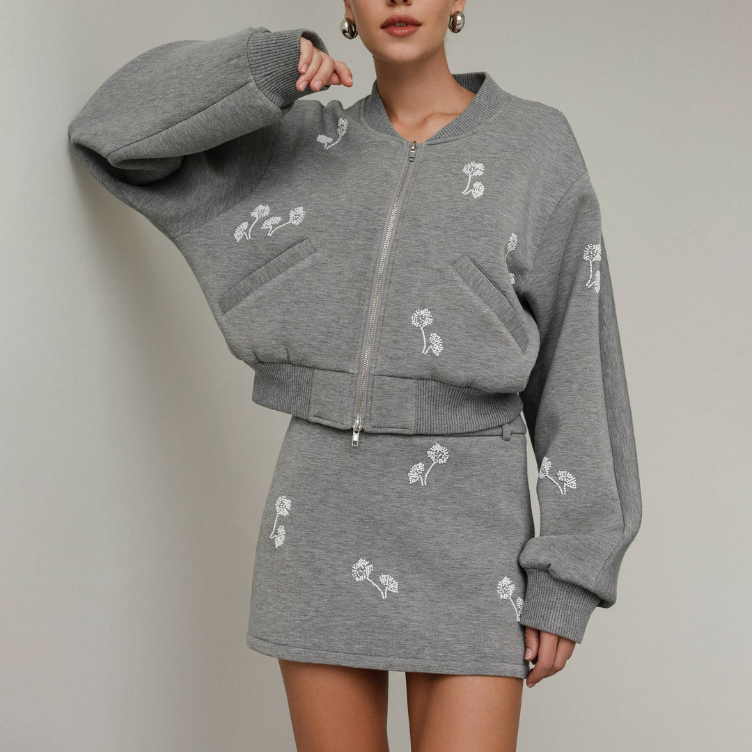 Kvinnors sportset med blommigt broderi Mirla-Eva Jonsson