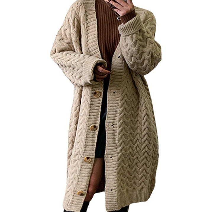 Kvinnors stickad cardigan med voluminös kabeldesign och praktiska knäppningar Mirla-Eva Jonsson