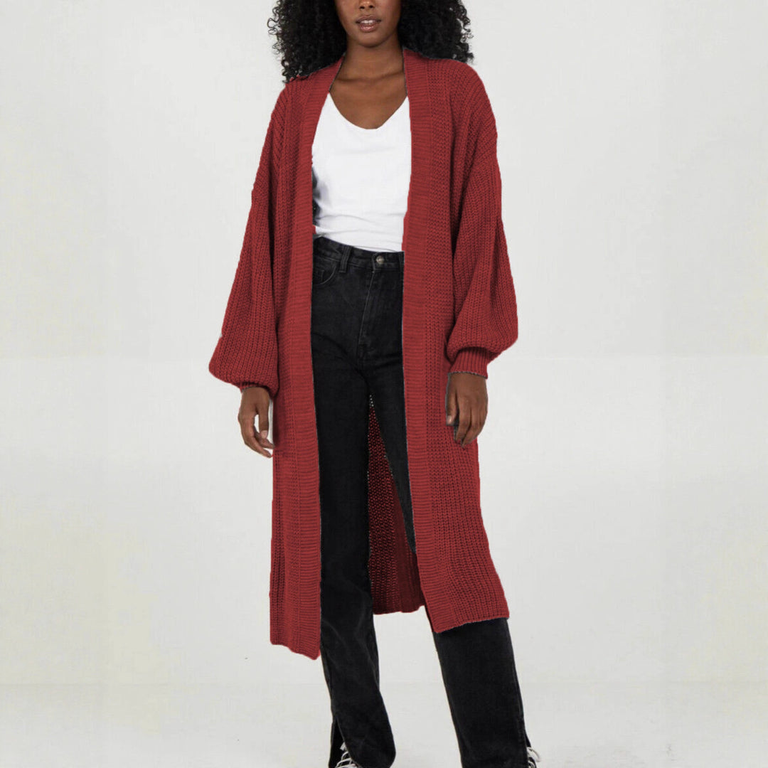 Kvinnors stickad kappa i avslappnad oversized design Mirla-Eva Jonsson