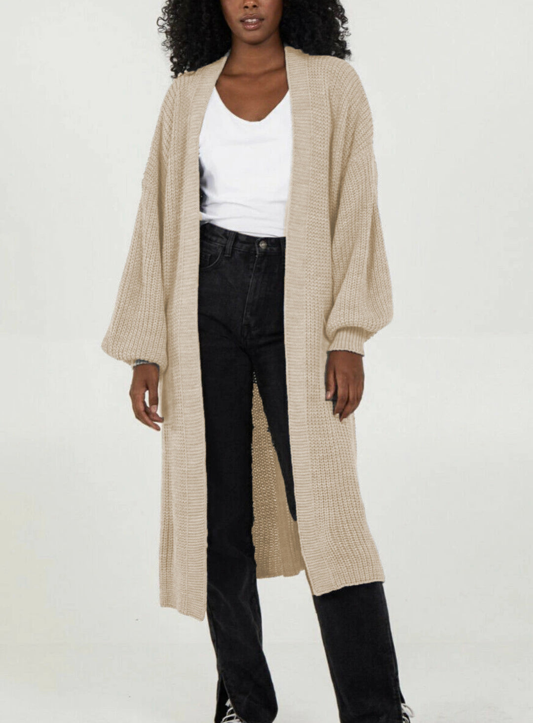 Kvinnors stickad kappa i avslappnad oversized design Mirla-Eva Jonsson