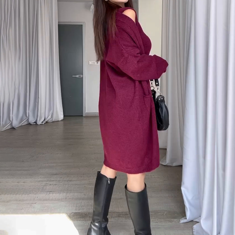 Kvinnors stickad kappa med en modern oversized passform och praktiska fickor Mirla-Eva Jonsson