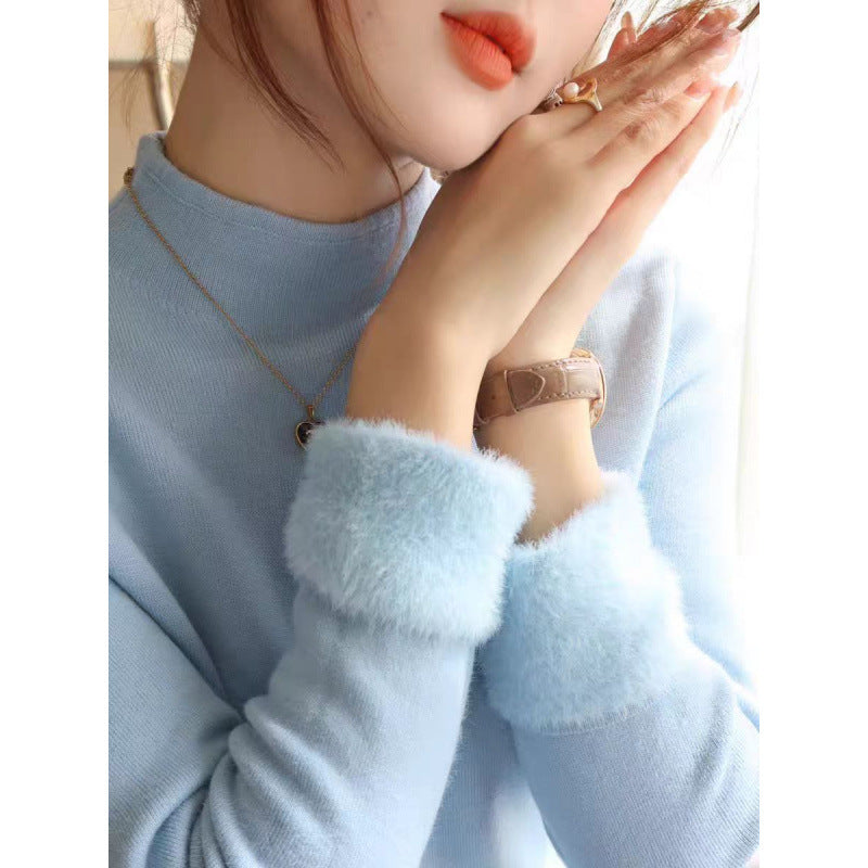 Kvinnors stickad pullover med fluffiga detaljer Mirla-Eva Jonsson