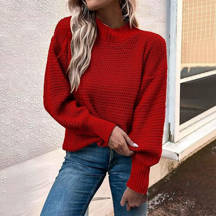 Kvinnors stickad pullover med hög krage och strukturerad stickning Mirla-Eva Jonsson