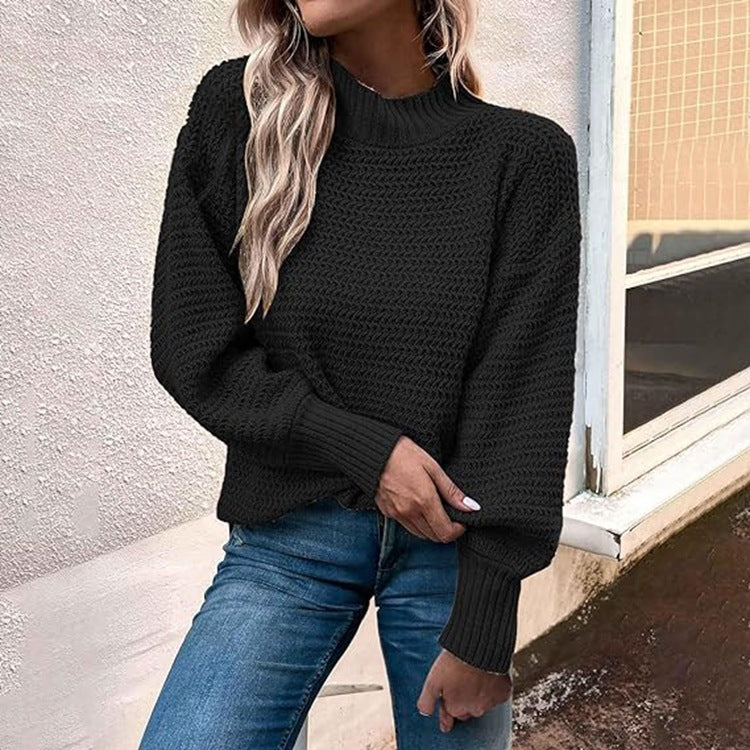 Kvinnors stickad pullover med hög krage och strukturerad stickning Mirla-Eva Jonsson