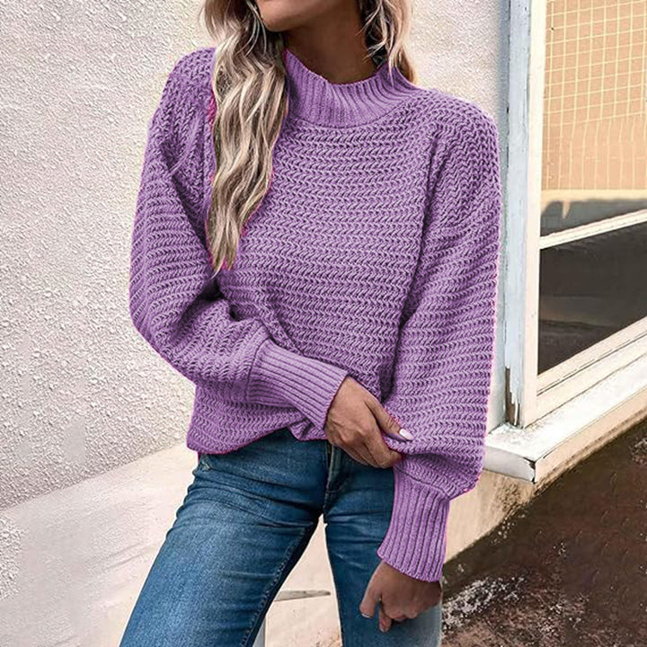 Kvinnors stickad pullover med hög krage och strukturerad stickning Mirla-Eva Jonsson
