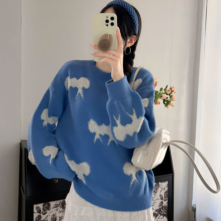 Kvinnors stickad pullover med lekfullt djurmotiv och avslappnad passform Mirla-Eva Jonsson