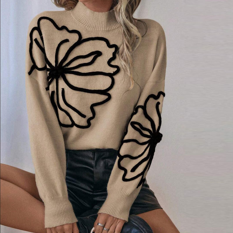 Kvinnors stickad tröja med blommigt 3D-design Mirla-Eva Jonsson