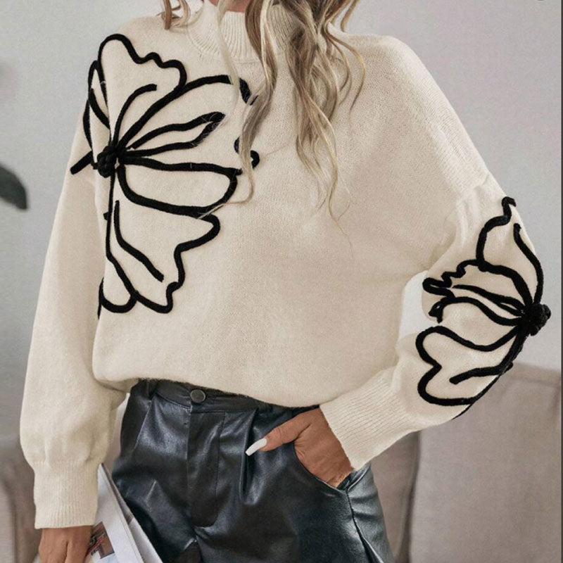 Kvinnors stickad tröja med blommigt 3D-design Mirla-Eva Jonsson