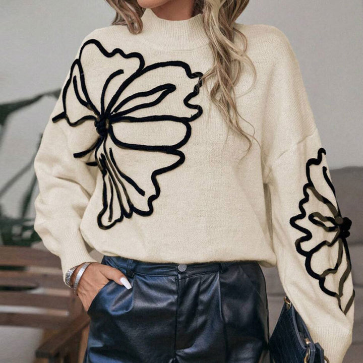 Kvinnors stickad tröja med blommigt 3D-design Mirla-Eva Jonsson