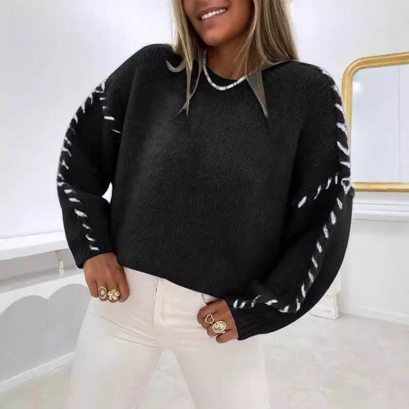 Kvinnors stickad tröja med dekorativa sömsdetaljer Mirla-Eva Jonsson
