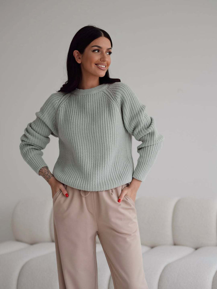 Kvinnors stickad tröja med eleganta ärmslut Mirla-Eva Jonsson