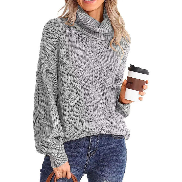 Kvinnors stickad tröja med hög krage och strukturerad stickad look Mirla-Eva Jonsson