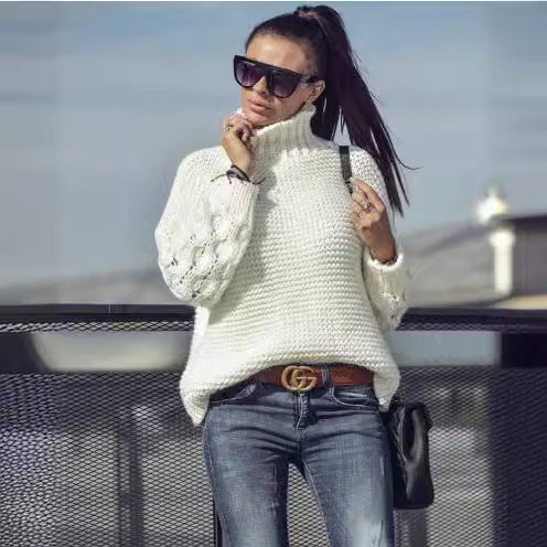 Kvinnors stickad tröja med hög krage och voluminösa ärmar Mirla-Eva Jonsson