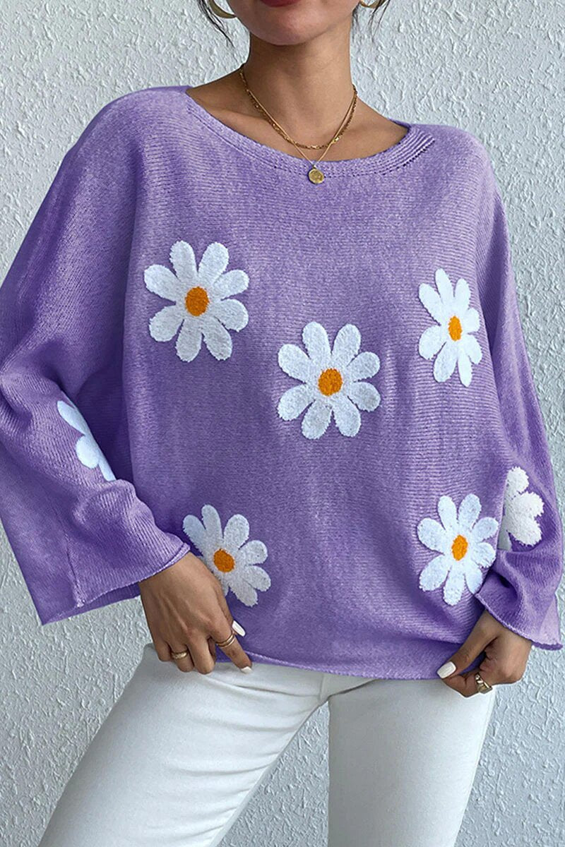 Kvinnors stickad tröja med lekfull blomsterdesign och lös passform Mirla-Eva Jonsson