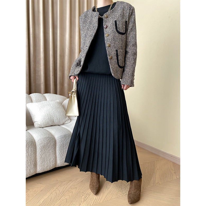 Kvinnors stickad tröja med oversized passform och elegant ribbad textur Mirla-Eva Jonsson
