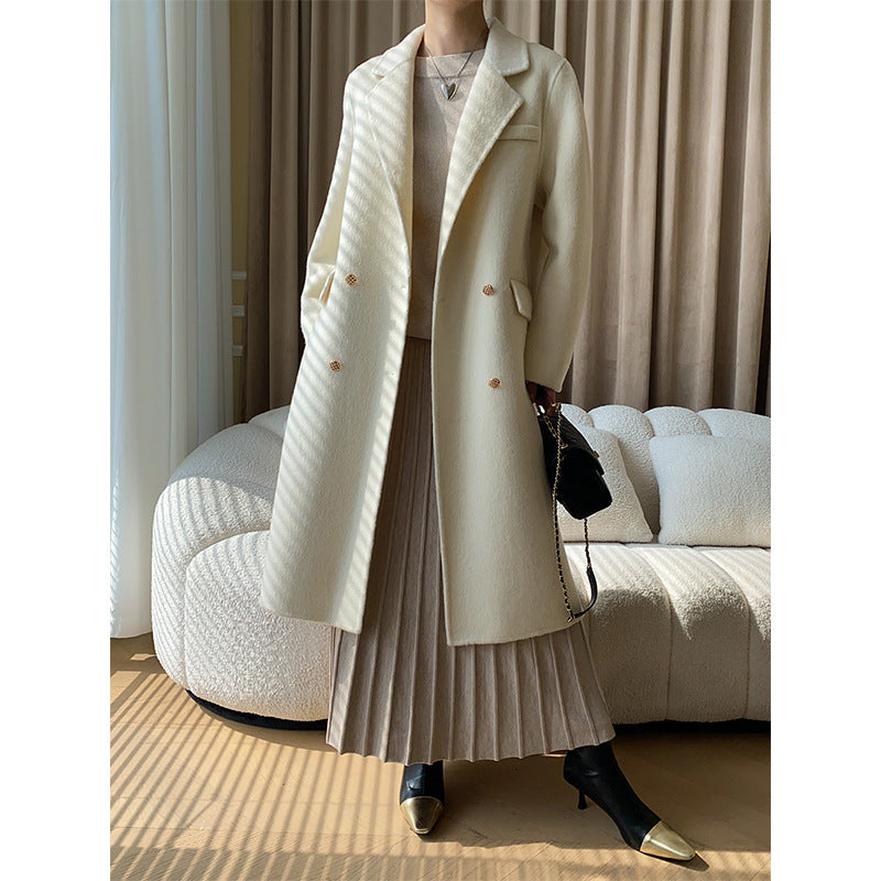 Kvinnors stickad tröja med oversized passform och elegant ribbad textur Mirla-Eva Jonsson