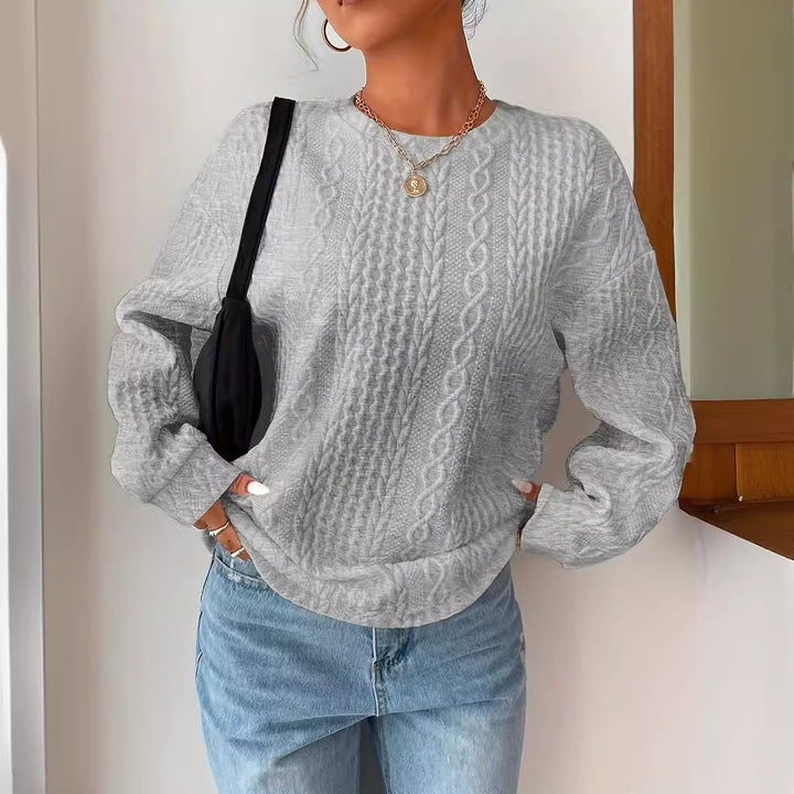 Kvinnors stickad tröja med texturerad look och avslappnad passform Mirla-Eva Jonsson