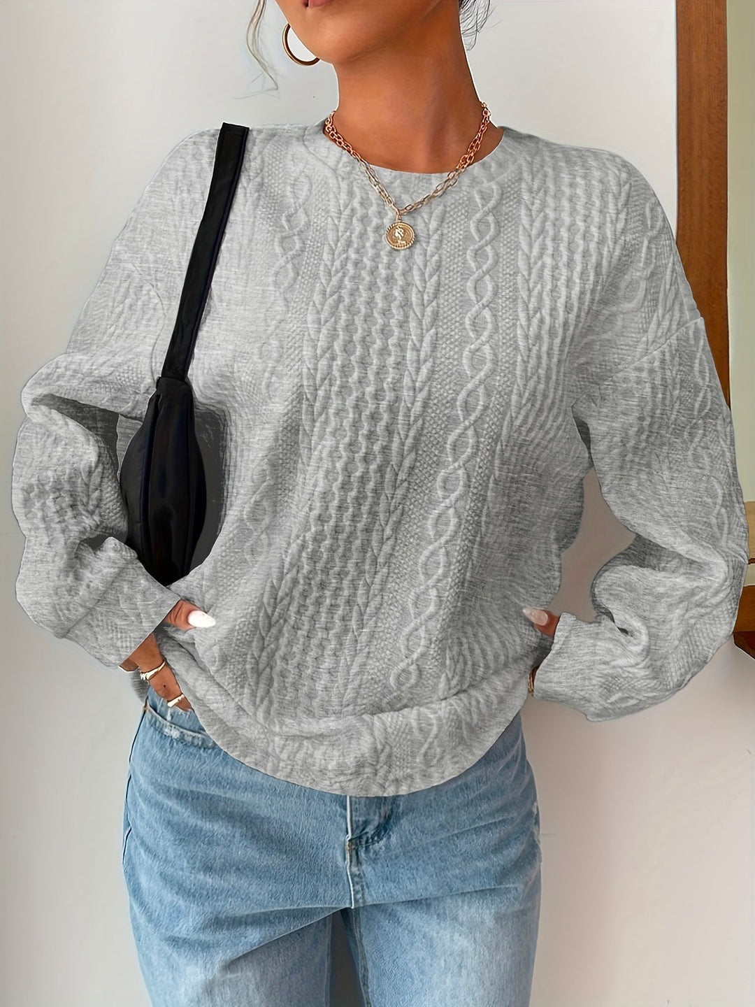 Kvinnors stickad tröja med texturerad look och avslappnad passform Mirla-Eva Jonsson