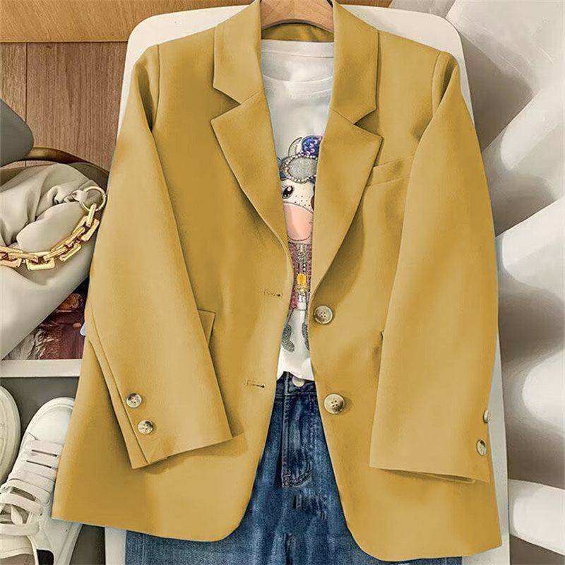 Kvinnors stiliga blazer med texturerat tyg och eleganta knappdetaljer Mirla-Eva Jonsson