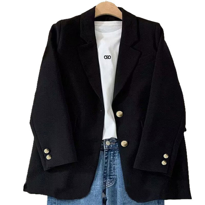 Kvinnors stiliga blazer med texturerat tyg och eleganta knappdetaljer Mirla-Eva Jonsson