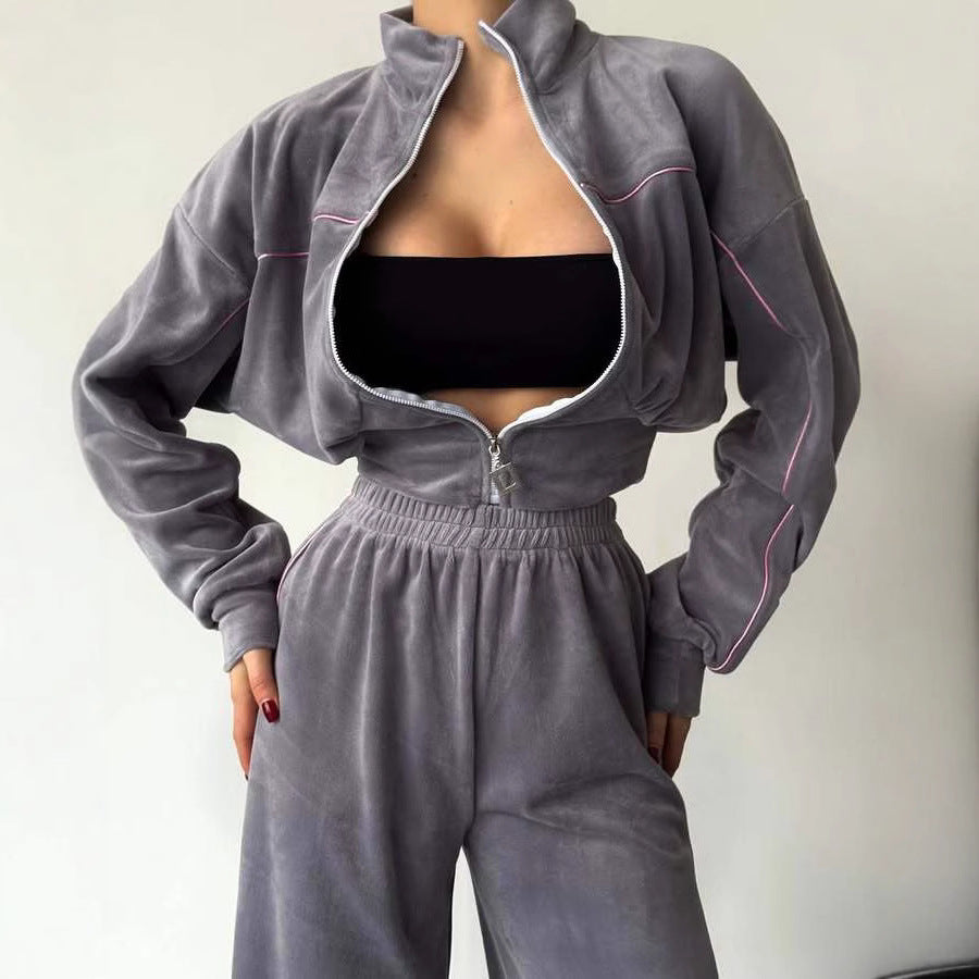 Kvinnors stiliga fleece träningsdräkt med kort dragkedja och elastisk midja Mirla-Eva Jonsson