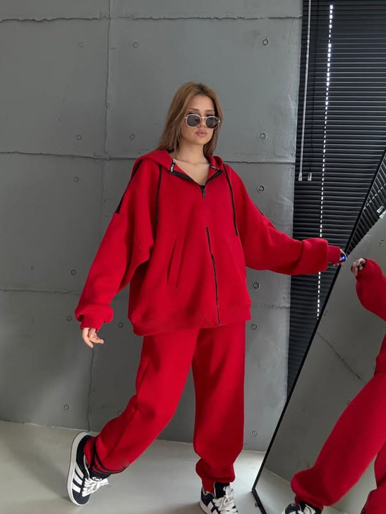 Kvinnors stiliga hoodie med dubbel dragkedja och avslappnad passform Mirla-Eva Jonsson