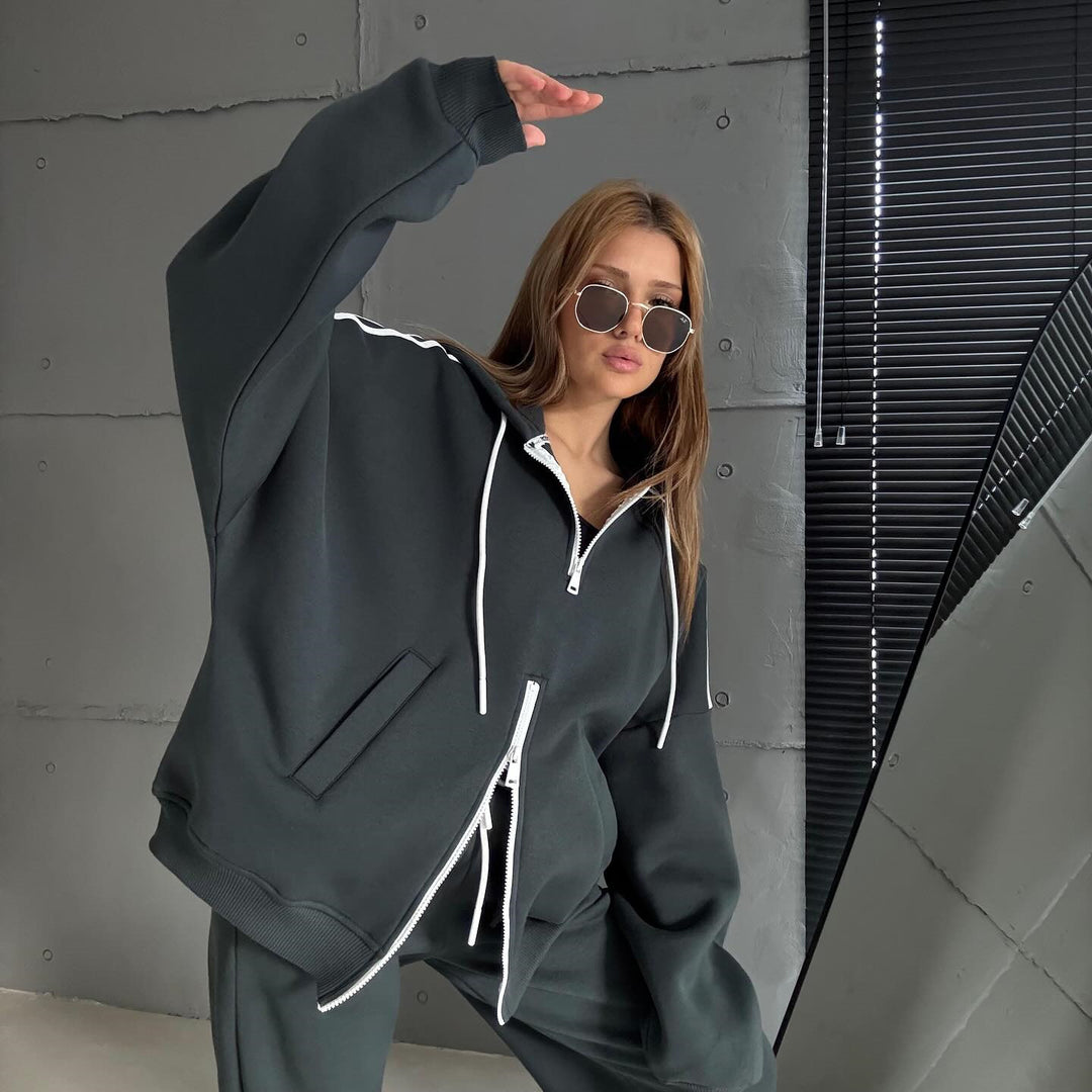 Kvinnors stiliga hoodie med dubbel dragkedja och avslappnad skärning Mirla-Eva Jonsson