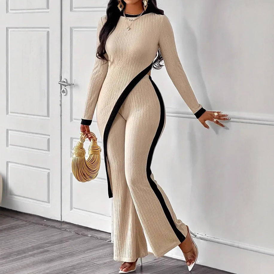 Kvinnors stiliga jumpsuit med asymmetrisk design och kontrasterande piping Mirla-Eva Jonsson