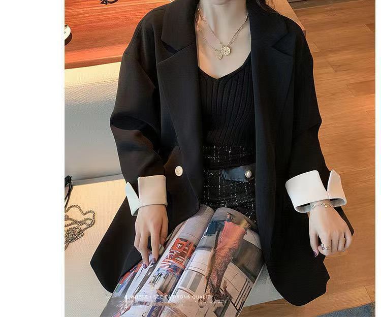 Kvinnors stiliga långärmad jacka med kontrasterande ärmar Mirla-Eva Jonsson