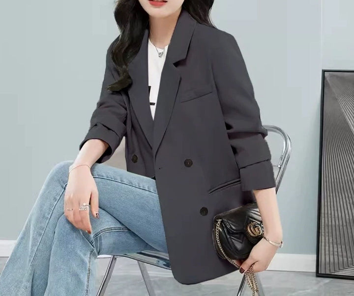 Kvinnors stiliga oversized blazer med dubbel knappslå och stiliga detaljer Mirla-Eva Jonsson