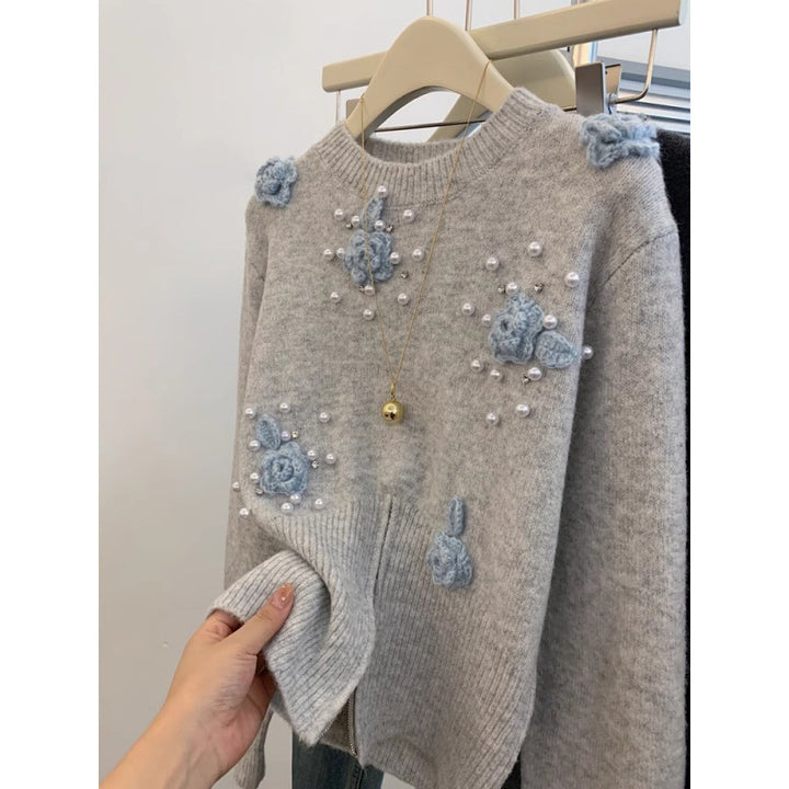 Kvinnors stiliga tröja med blommiga applikationer Mirla-Eva Jonsson