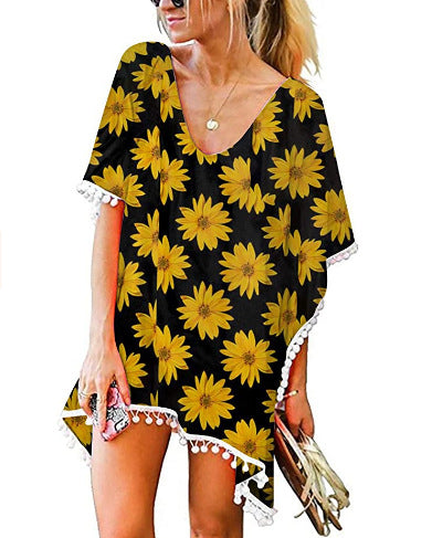 Kvinnors strandtunika med blommönster och poncho-stil Mirla-Eva Jonsson