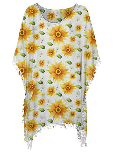 Kvinnors strandtunika med blommönster och poncho-stil Mirla-Eva Jonsson