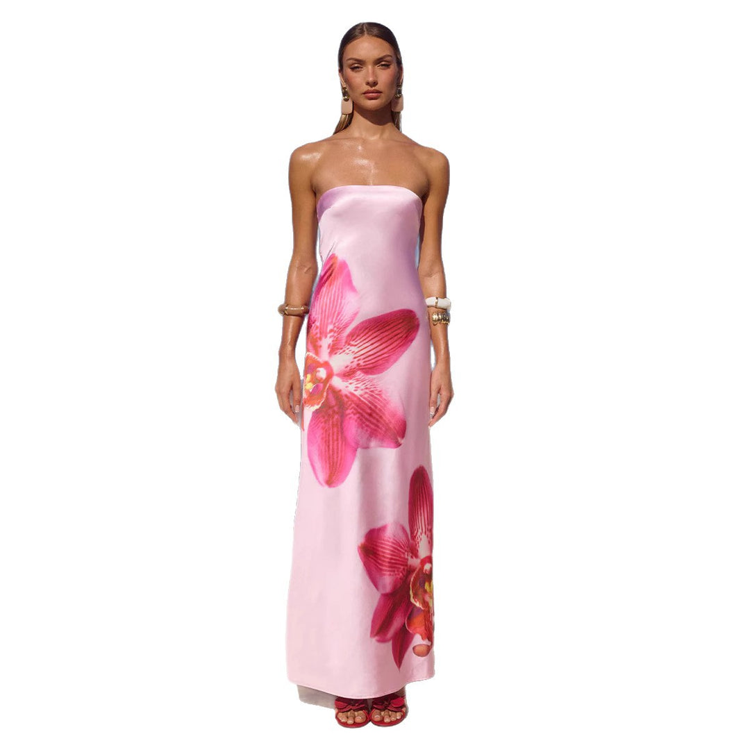 Kvinnors strapless maxiklänning med blommönster och flödande tyg-Eva Jonsson