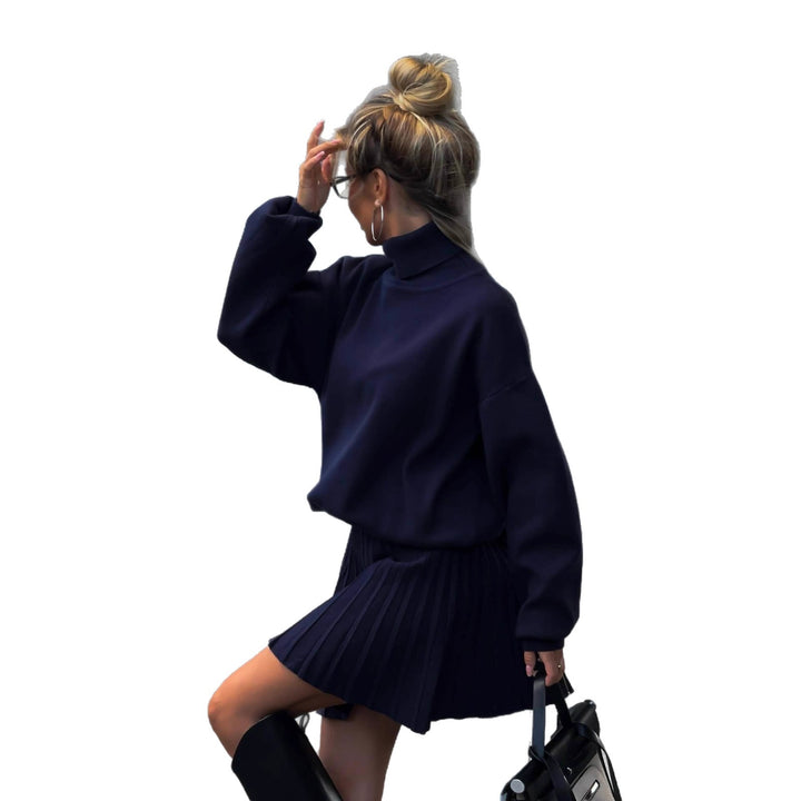Kvinnors styling set med avslappnad tröja och veckad kjol Mirla-Eva Jonsson