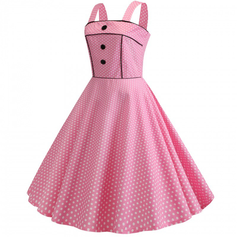 Kvinnors svingklänning med prickar och elegant midjebälte Mirla-Eva Jonsson