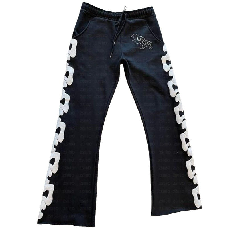 Kvinnors sweatpants med kreativa sidodetaljer och bekväm passform Mirla-Eva Jonsson