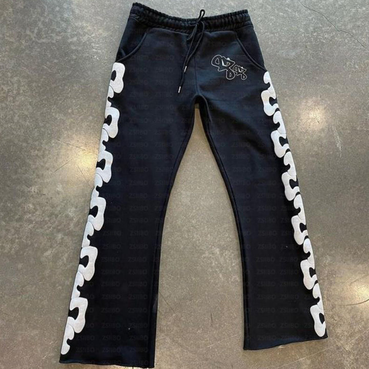 Kvinnors sweatpants med kreativa sidodetaljer och bekväm passform Mirla-Eva Jonsson
