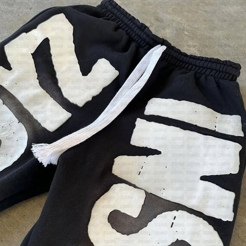 Kvinnors sweatpants med stort iögonfallande logotryck Mirla-Eva Jonsson