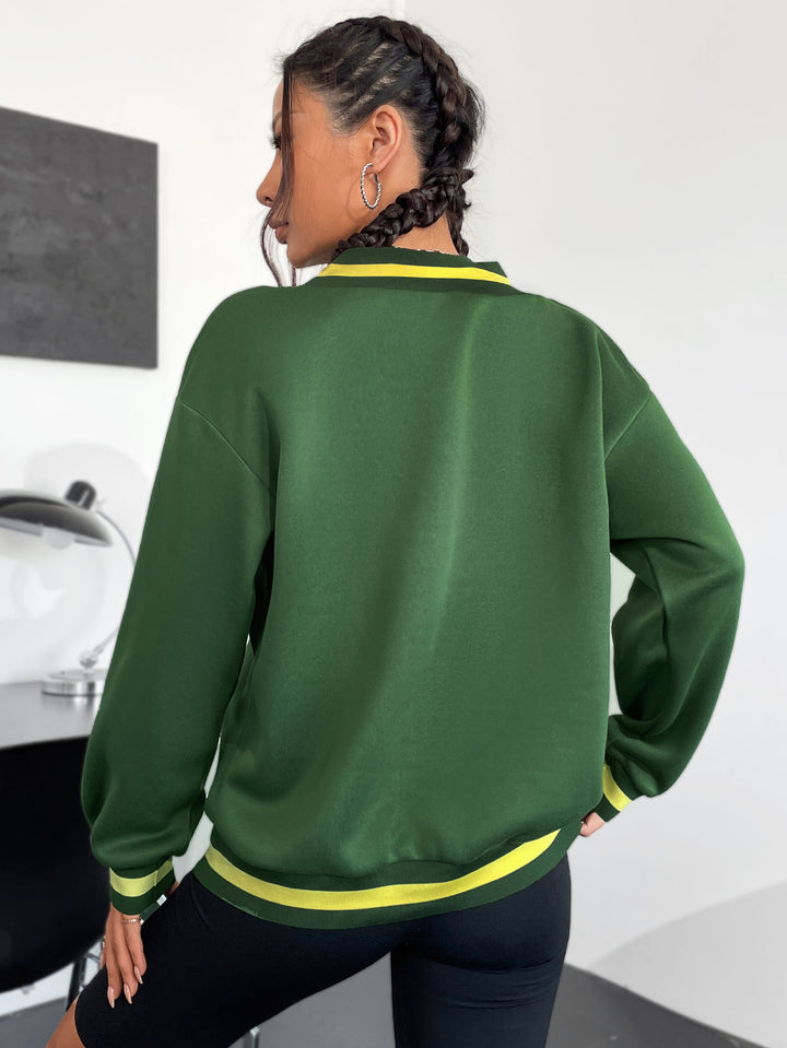 Kvinnors sweatshirt med V-hals och kreativ wellnesstryck Mirla-Eva Jonsson