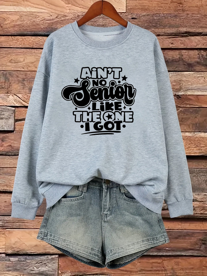 Kvinnors sweatshirt med avslappnad slogan design Mirla-Eva Jonsson