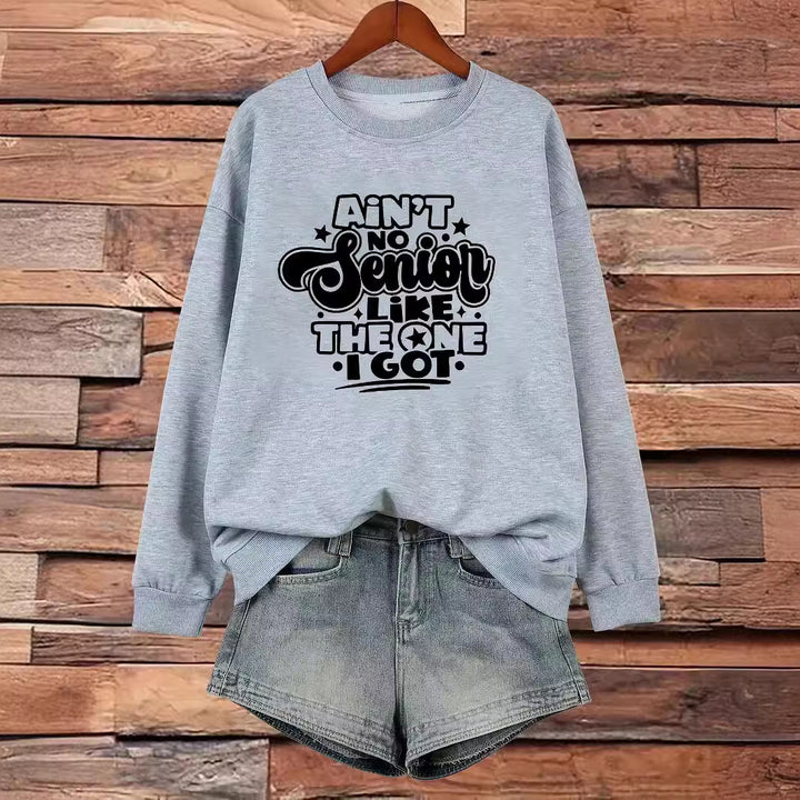 Kvinnors sweatshirt med avslappnad slogan design Mirla-Eva Jonsson