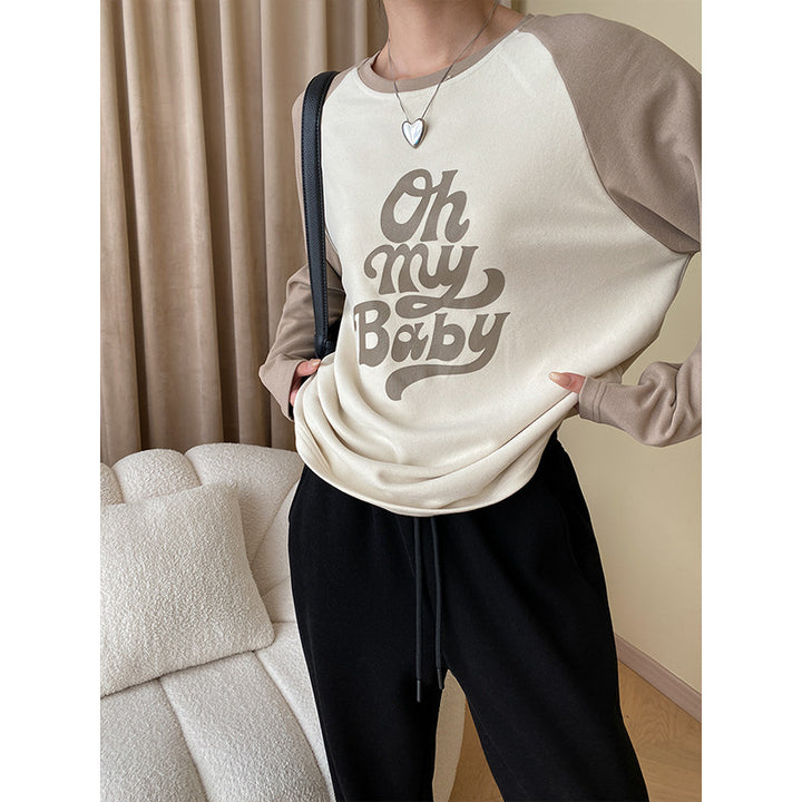 Kvinnors sweatshirt med avslappnad text och långa ärmar Mirla-Eva Jonsson