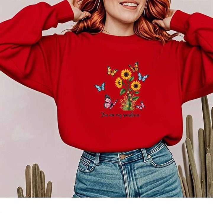 Kvinnors sweatshirt med blommig design och motiverande tryck Mirla-Eva Jonsson